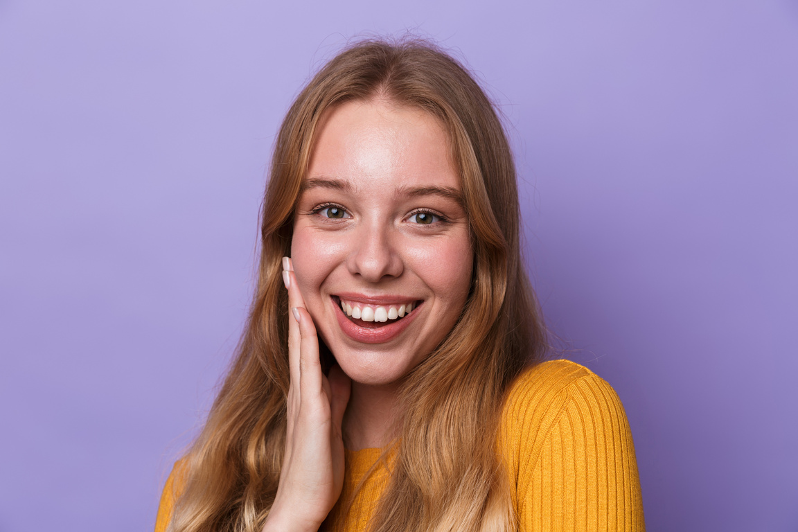 Photo of Happy Young Woman Smiling 